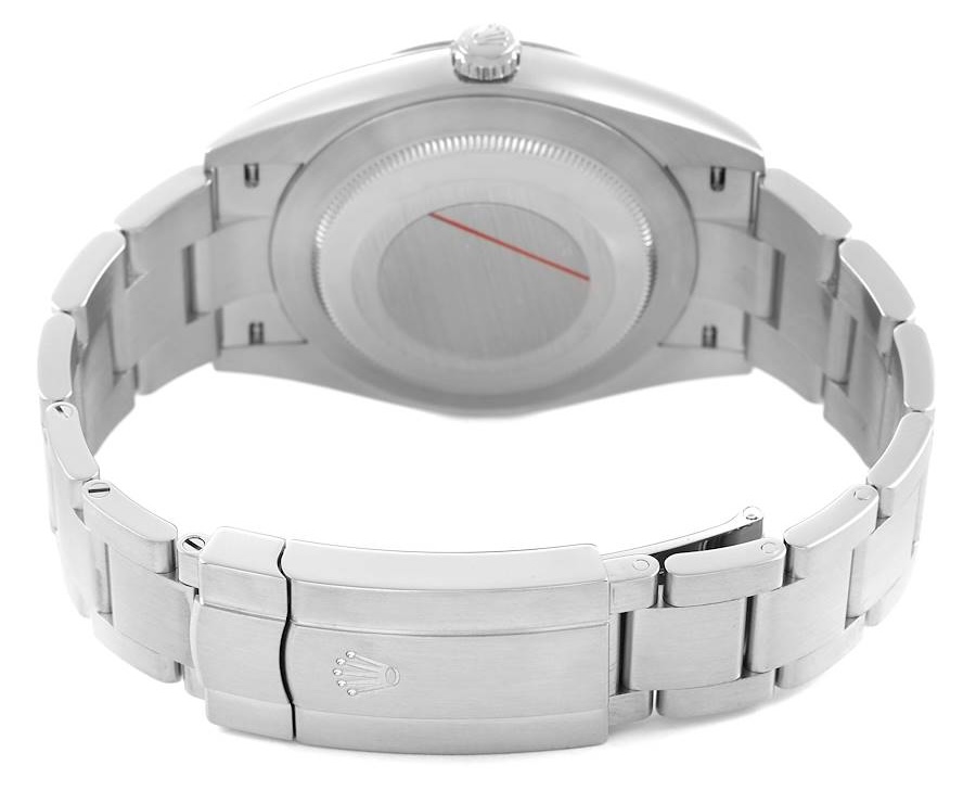 The solid, unengraved stainless steel caseback of a genuine Rolex watch on an Oyster bracelet.