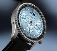 Macro profile view of the solid platinum Breitling Navitimer B19 perpetual calendar with ice blue dial.
