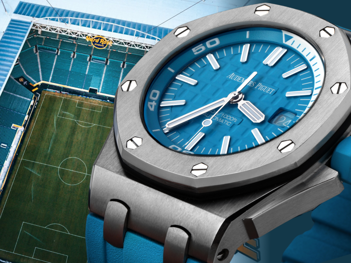 An Audemars Piguet Royal Oak Offshore Diver in stainless steel with a blue waffle dial overlaid against a panoramic view of Hard Rock Stadium in Miami.