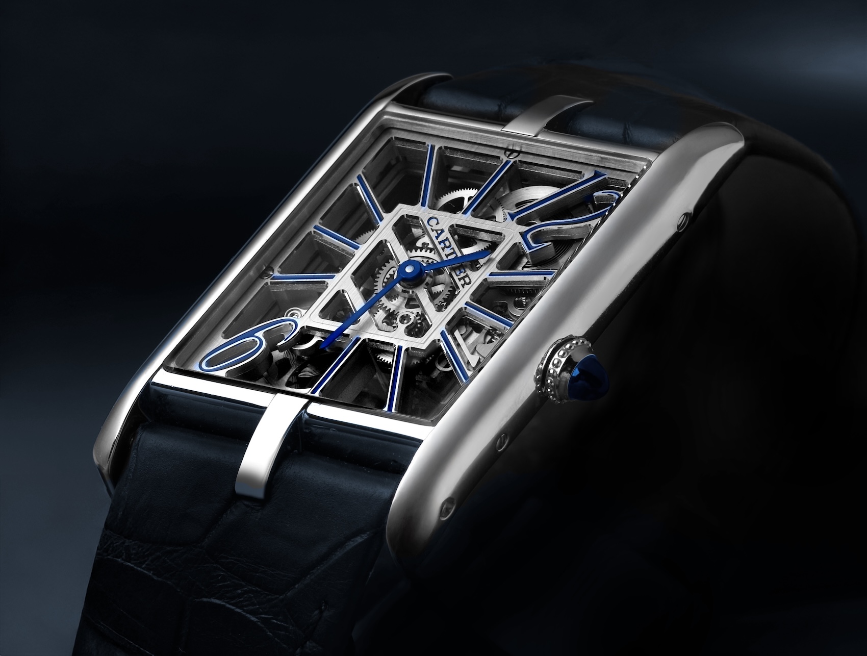 Cartier Tank Asymetrique Skeleton Platinum WHTA0012 with blue lacquered bridges