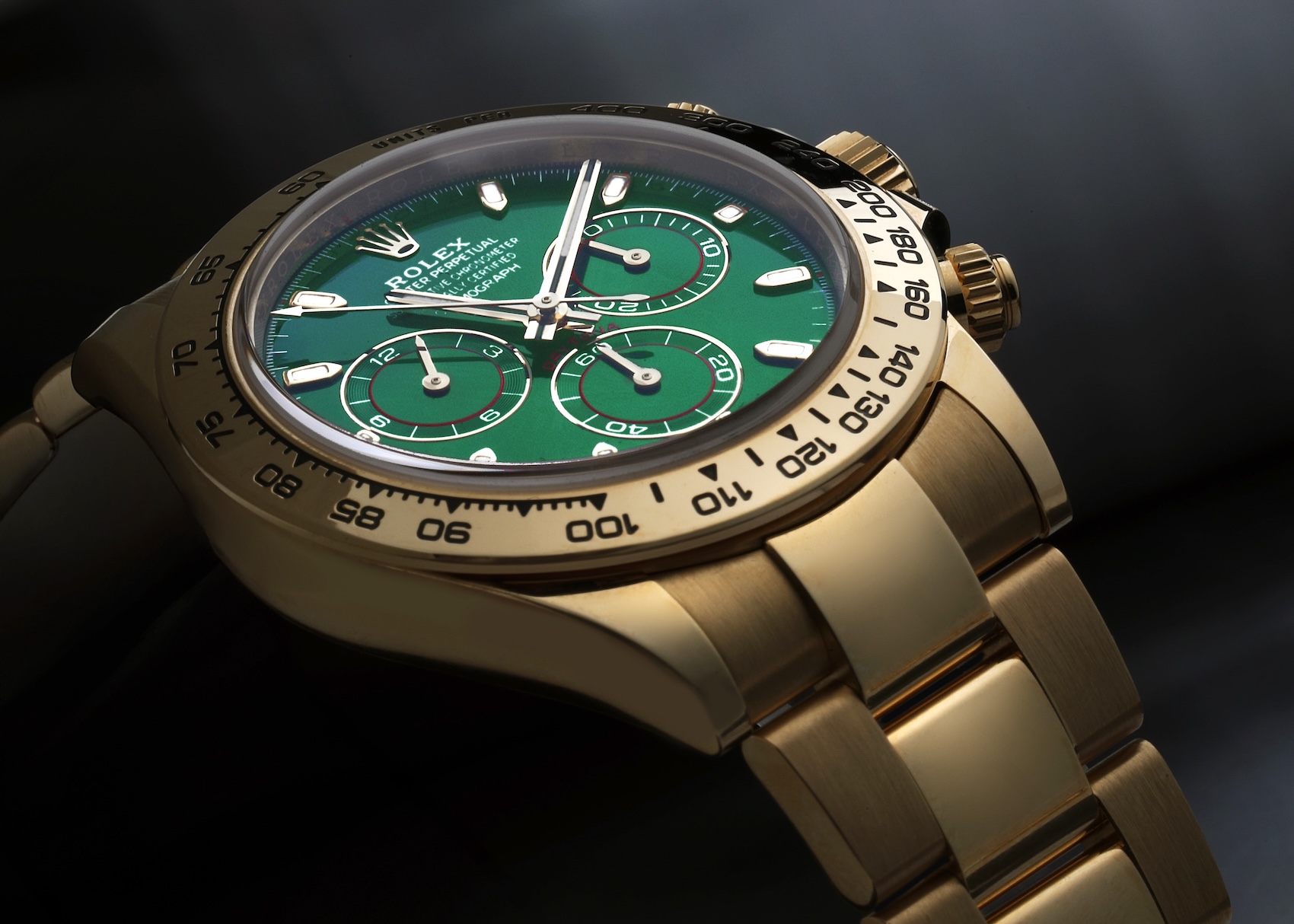 Rolex Cosmograph Daytona in 18k yellow gold with a vibrant green dial, reference 116508.