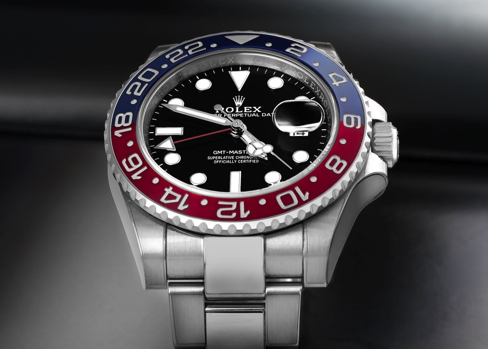 Close up of the stainless steel Rolex Pepsi 126710BLRO on an Oyster bracelet
