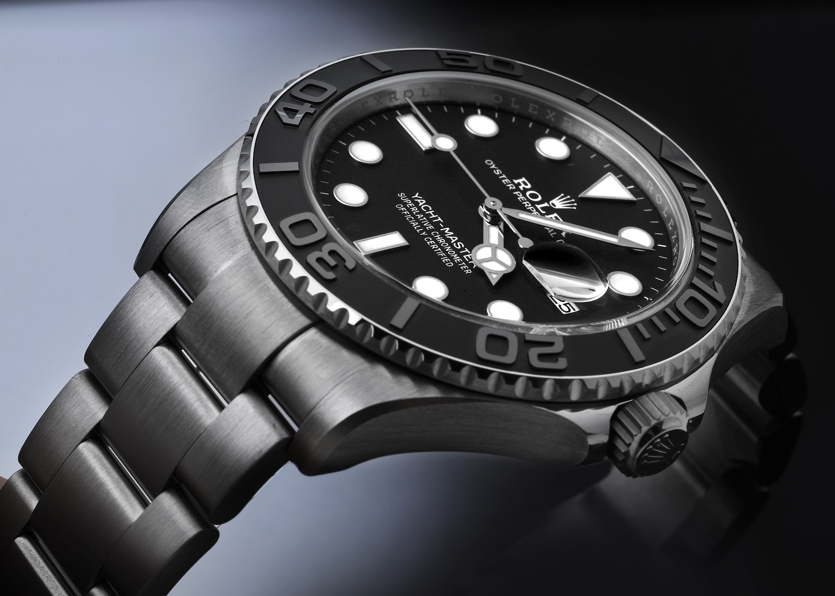 Profile view of a 42mm Rolex Yacht-Master reference 226627 crafted entirely in matte dark gray RLX titanium with an intense black dial and matching titanium bracelet.