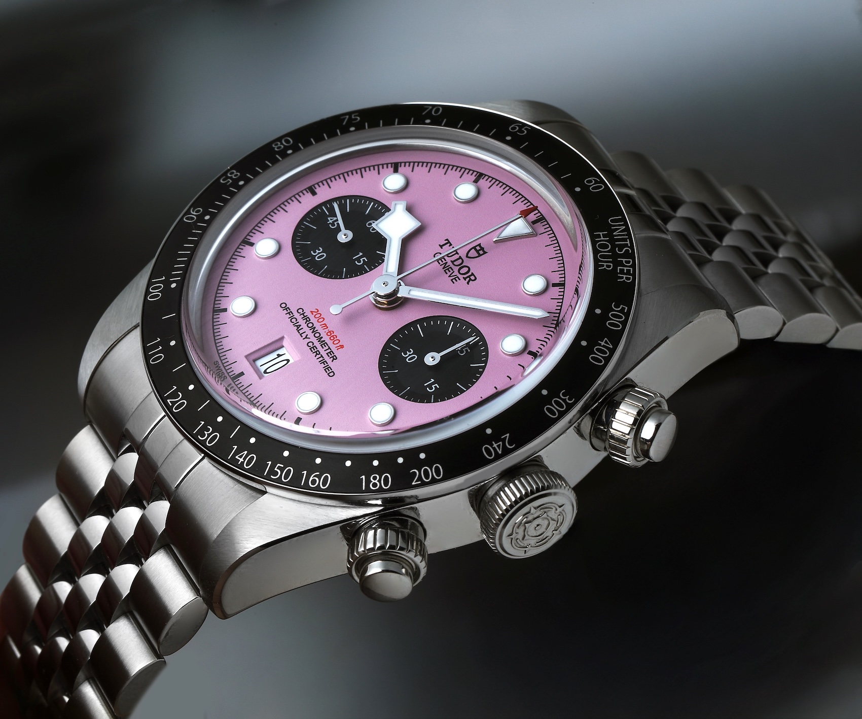 Tudor Black Bay Chrono 41mm with a pastel pink dial and black sub-counters on a steel bracelet