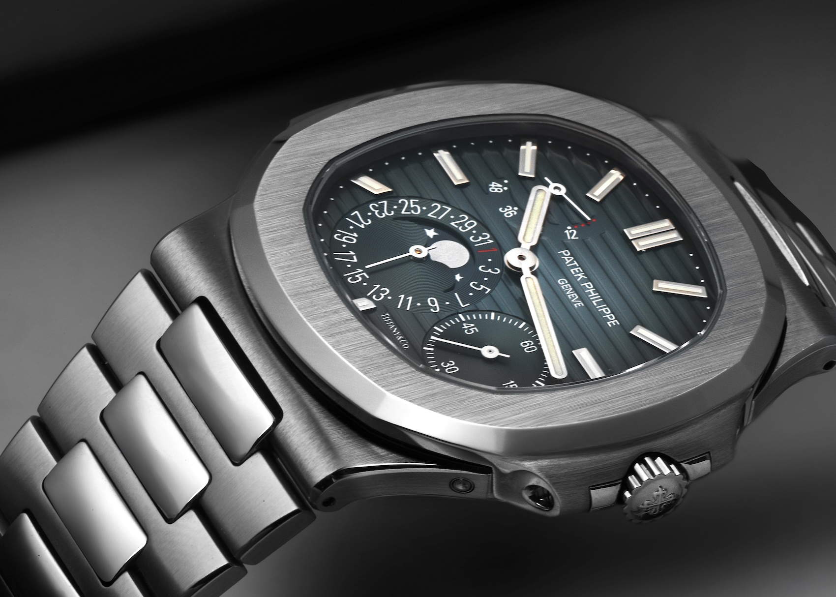Close-up of the Patek Philippe Nautilus 5712/1A Stainless Steel with the highly coveted Tiffany Co. stamp on the dial.
