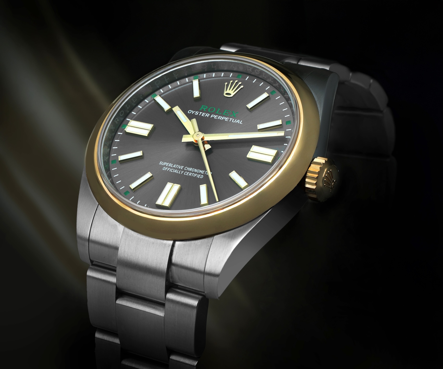 Rolex Oyster Perpetual 41 reference 134303 two-tone watch with slate dial on dark background.