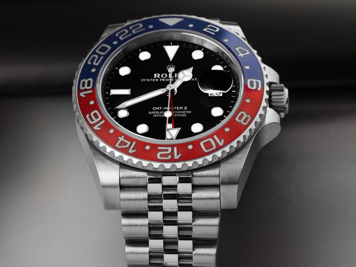 Close-up of a stainless steel Rolex GMT-Master II Pepsi reference 126710BLRO on a Jubilee bracelet.