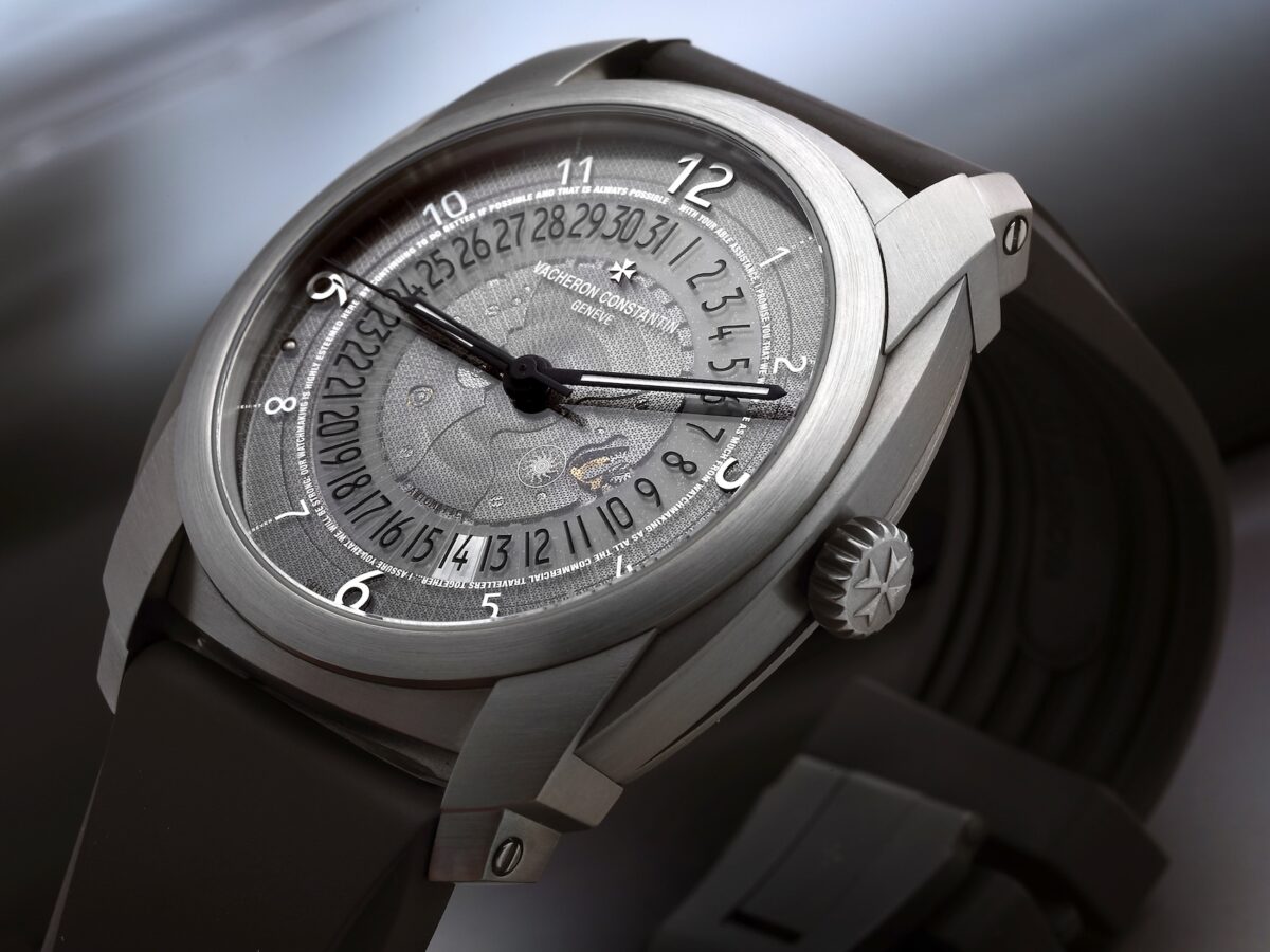 Vacheron Constantin Quai de lÎle Reference 86050 in titanium with a transparent sapphire dial displaying date numerals.